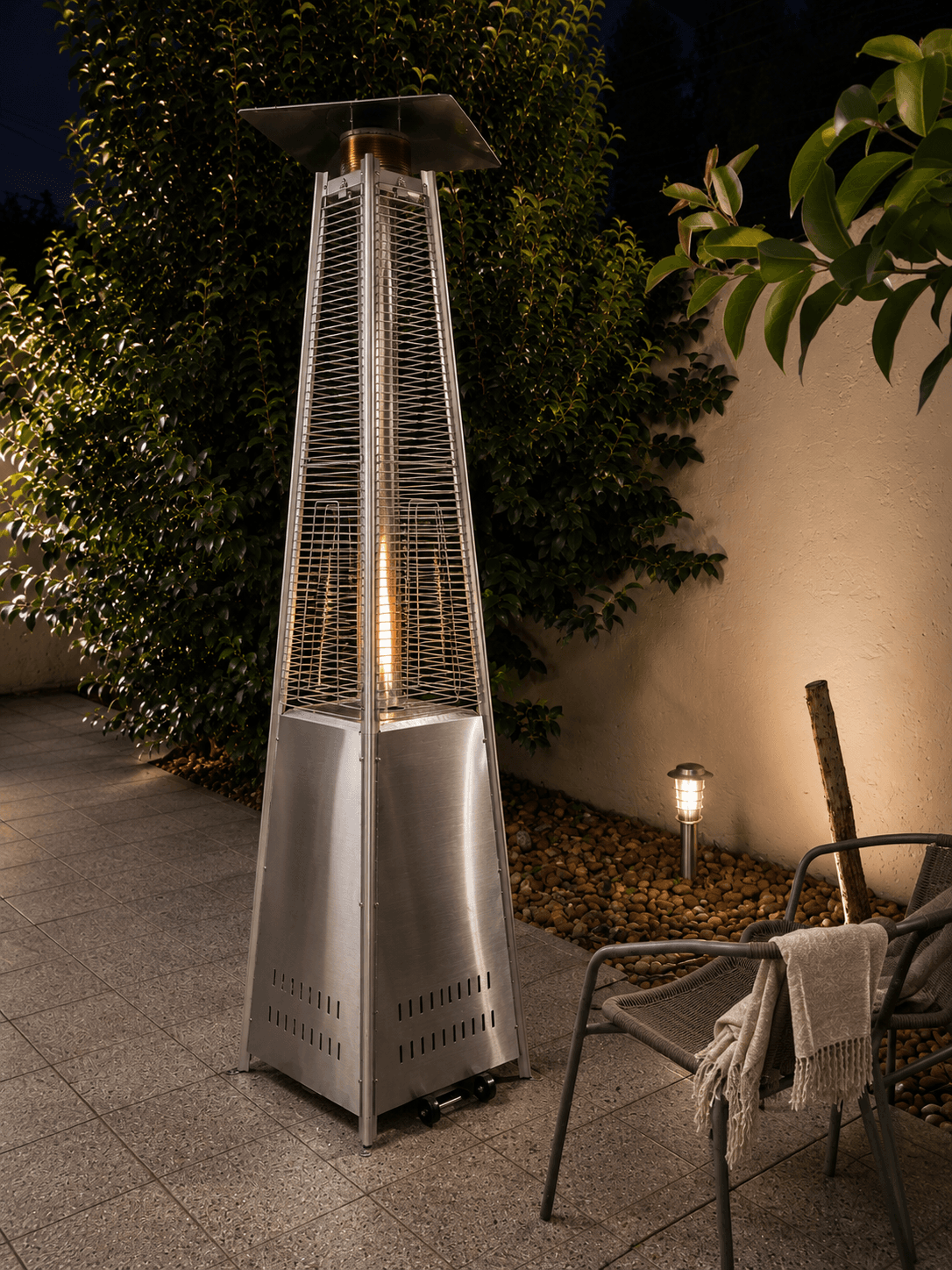 Pyramid outdoor heater at night
